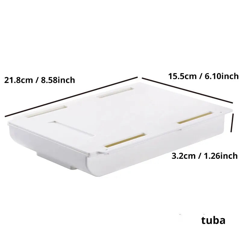 1 white self-adhesive storage box, a tray for makeup pencils and more, which tucks away under the desk