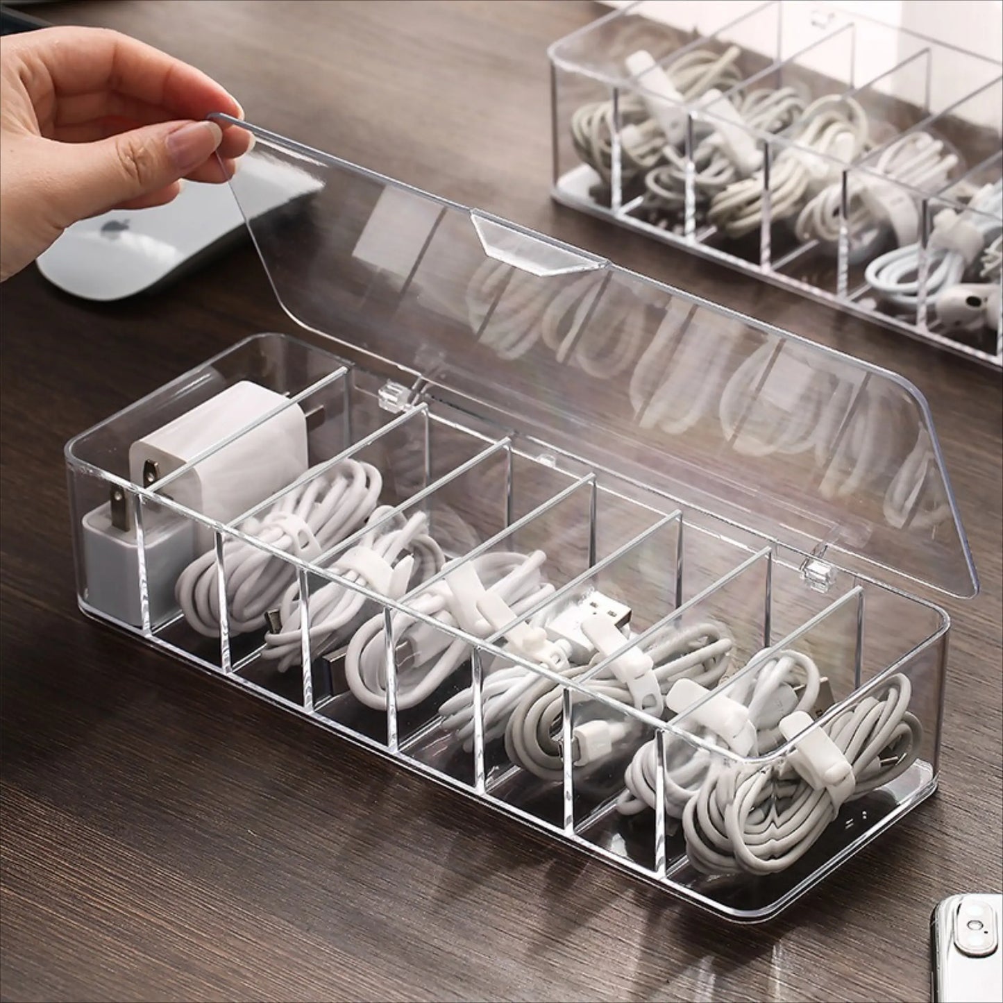 Clear plastic container for storing cables 