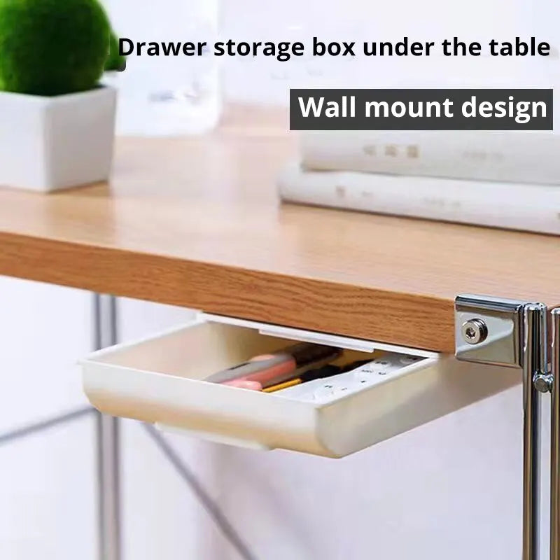 1 white self-adhesive storage box, a tray for makeup pencils and more, which tucks away under the desk